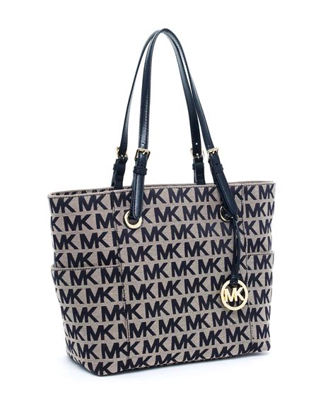 michael kors large signature tote|Michael Kors black signature handbag.